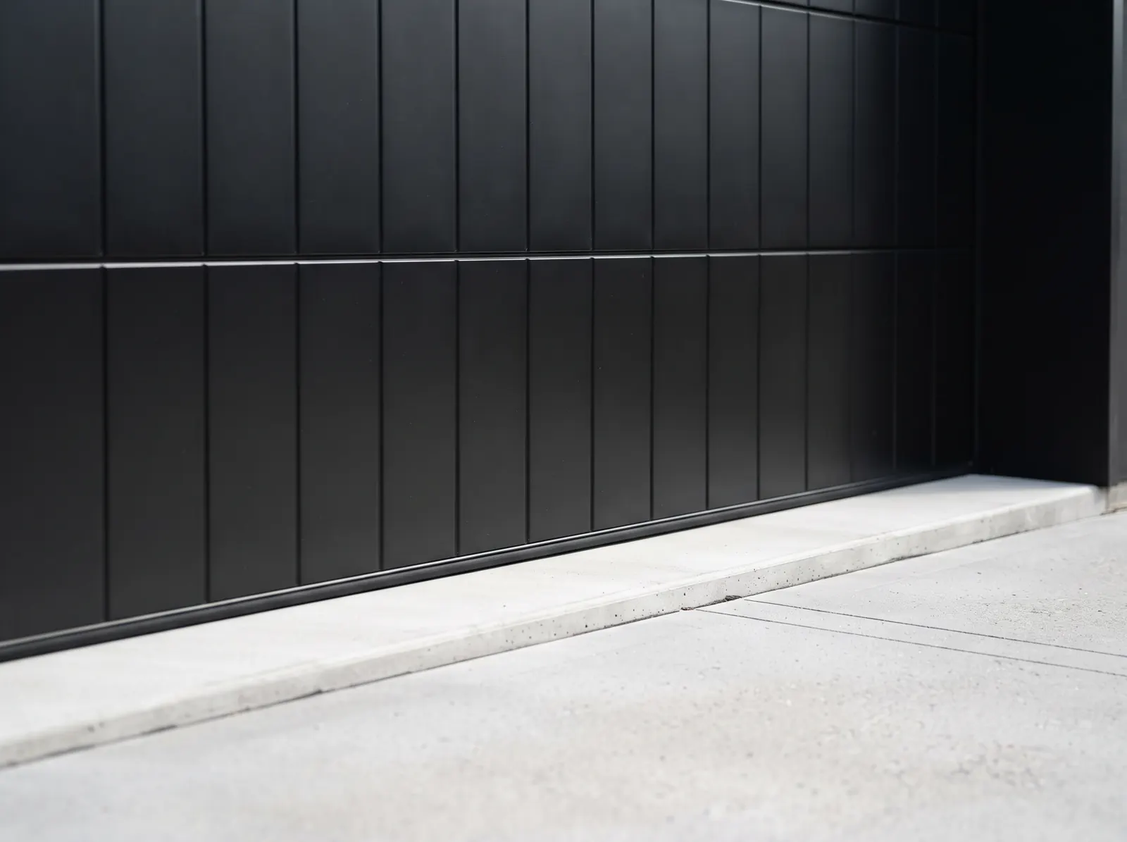 Réparation porte de garage basculante à Mons